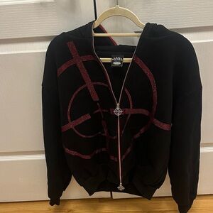 Named Collective black hoodie with red circular  rhinestone design